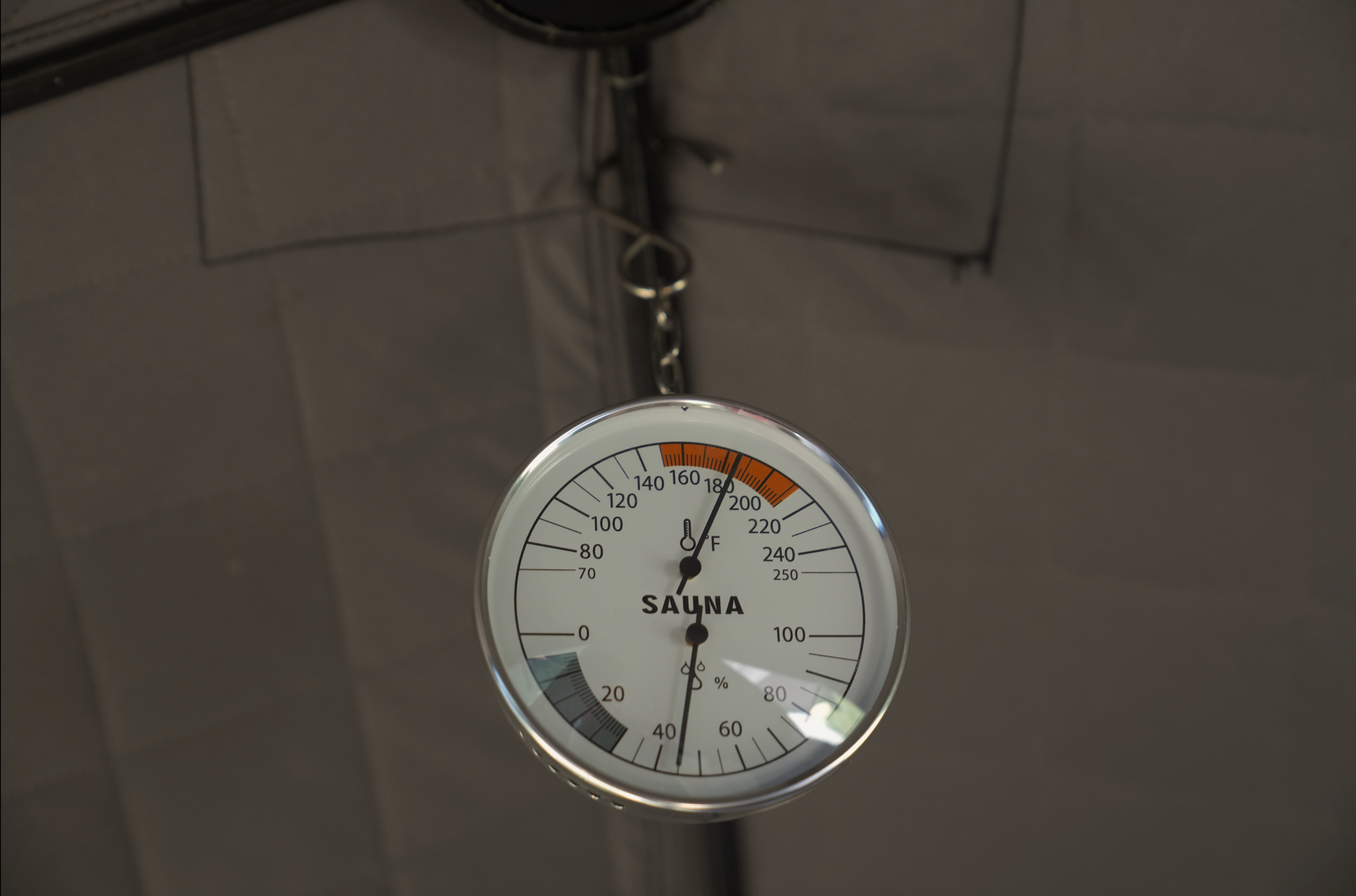 Wide-Range Sauna Thermometer/Hygrometer | Accurate Sauna Thermometer displaying temperature and humidity for precise monitoring.