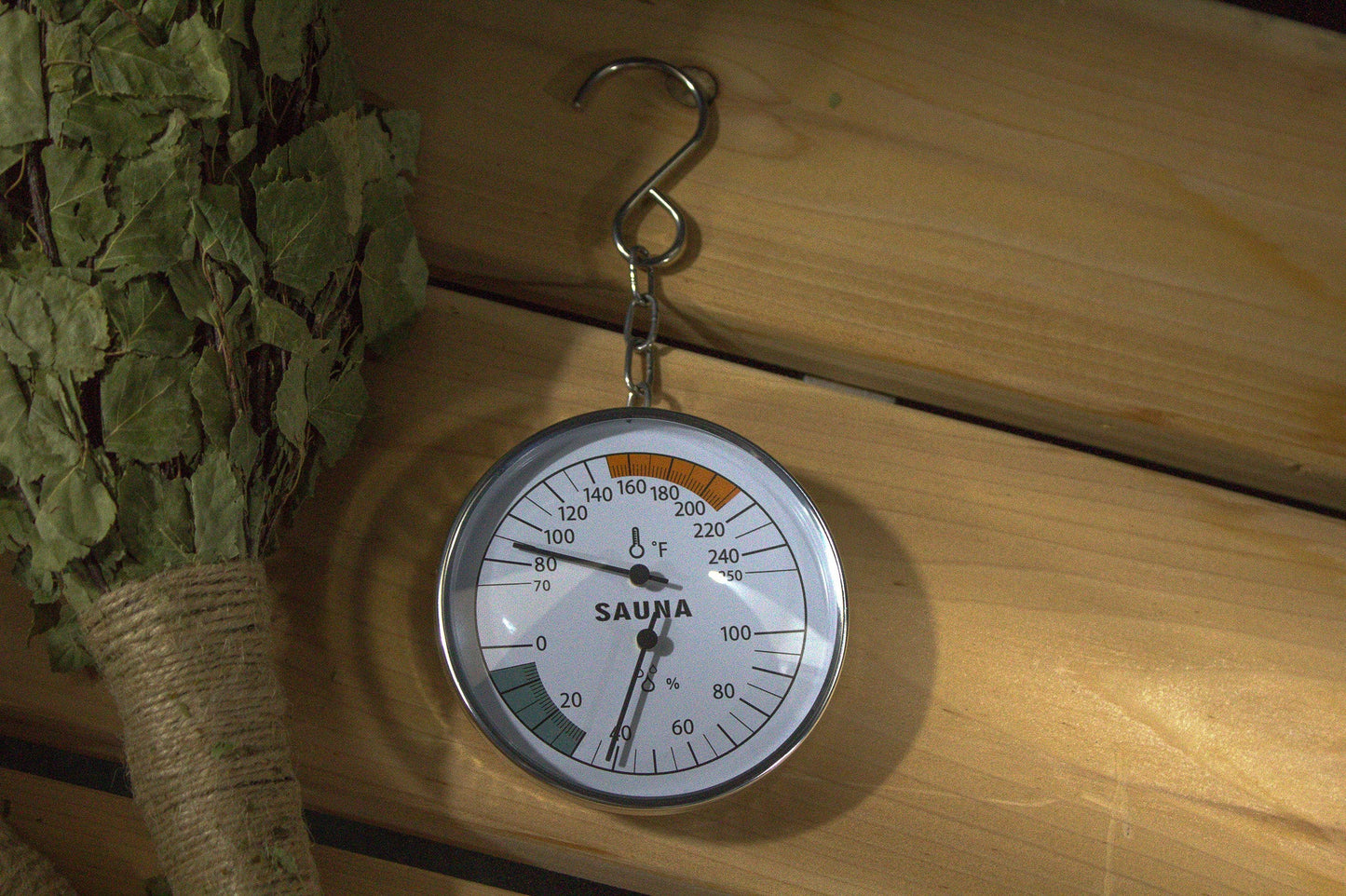 Wide-Range Sauna Thermometer/Hygrometer | Accurate Sauna Thermometer with real-time monitoring, no batteries, on a wooden surface.