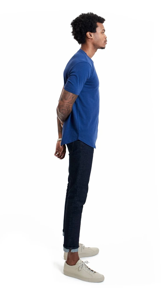Man wearing 100% Pima Cotton Short Sleeve T-shirt in blue, side view