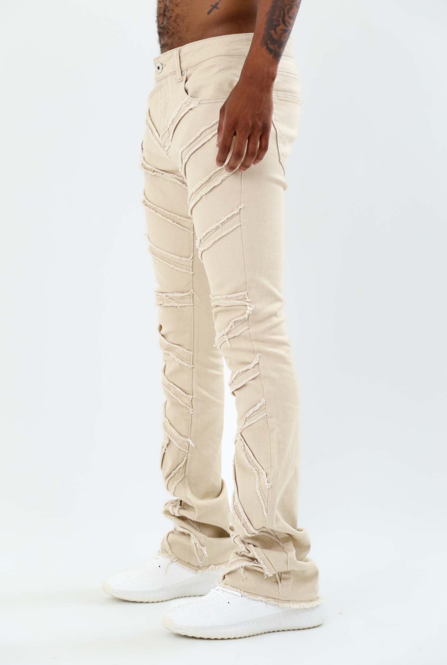 AJS410 SHREDDED STACKED JEANS with mid-rise waist, five-pocket design, belt loops, zipper fly, and stretchy cotton fabric.