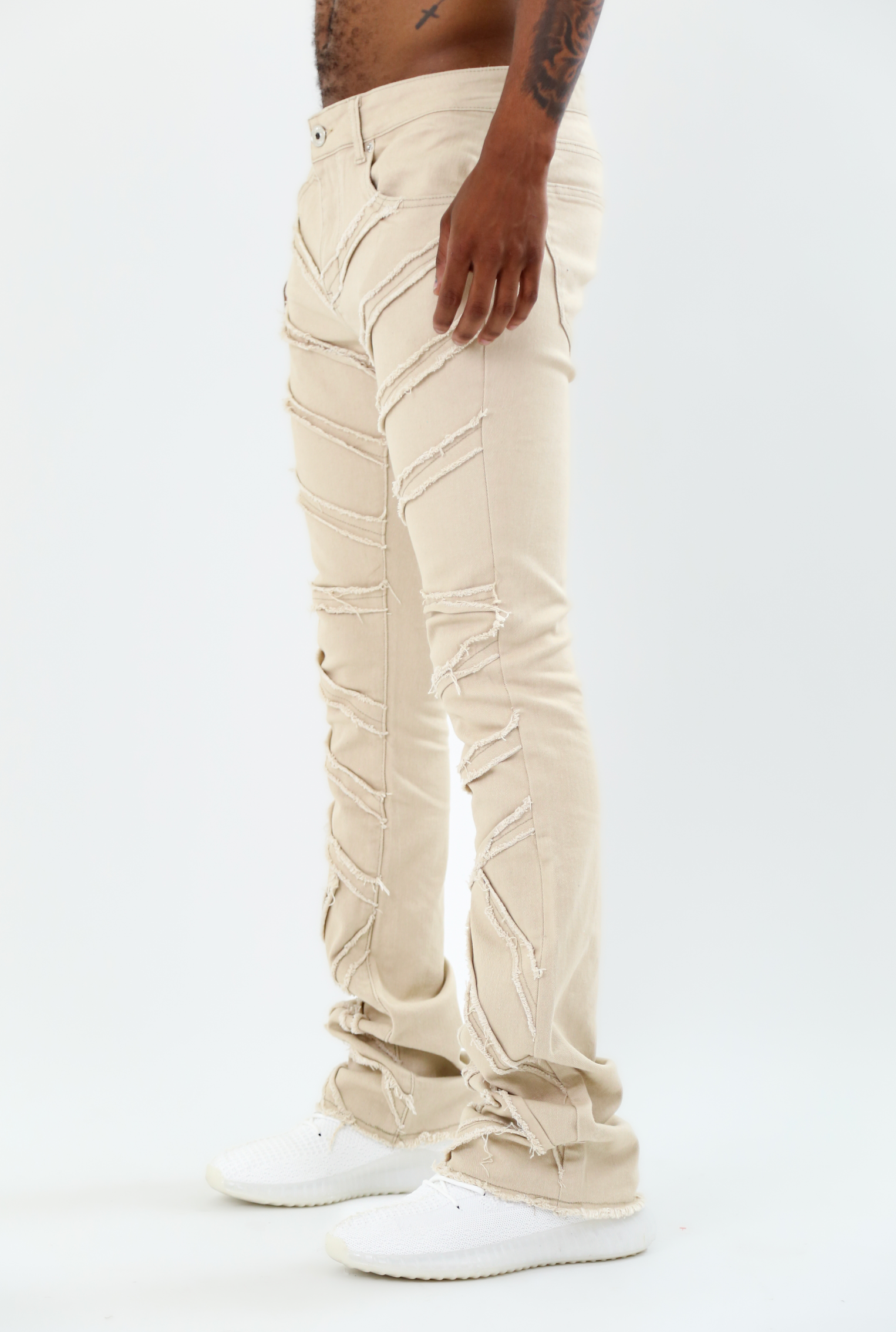 AJS410 SHREDDED STACKED JEANS with mid-rise waist, five-pocket design, belt loops, zipper fly, and stretchy cotton fabric.