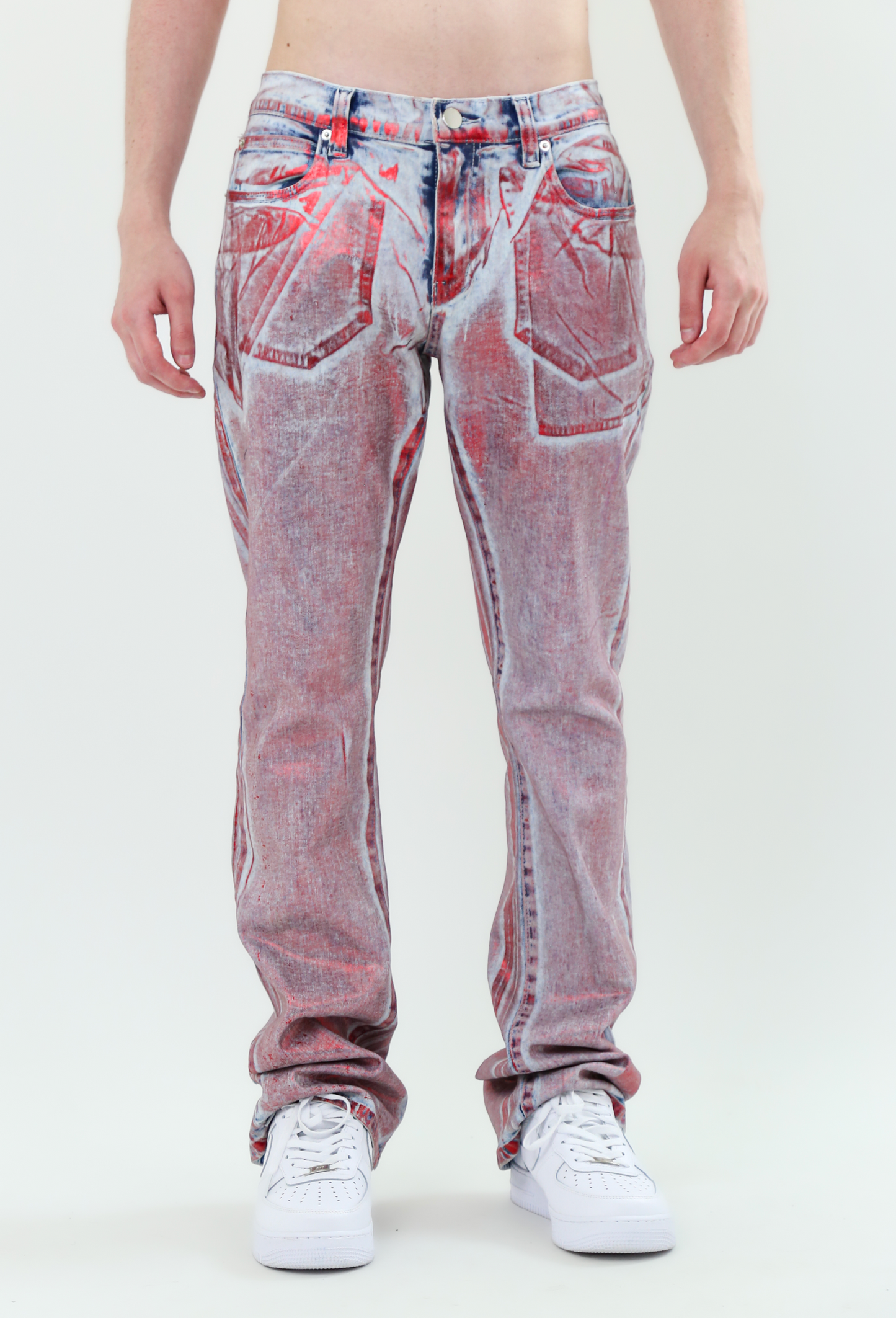 Model wearing ASJ08 FOIL WASH STACKED JEANS with mid-rise waist and stretchy fabric, featuring foil wash and stacked leg design.
