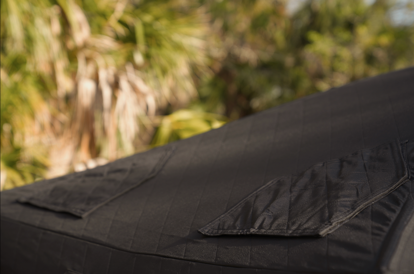 Close-up of Dome Sauna Tent (8-person; tent only) fabric illustrating durability and design against a natural background.