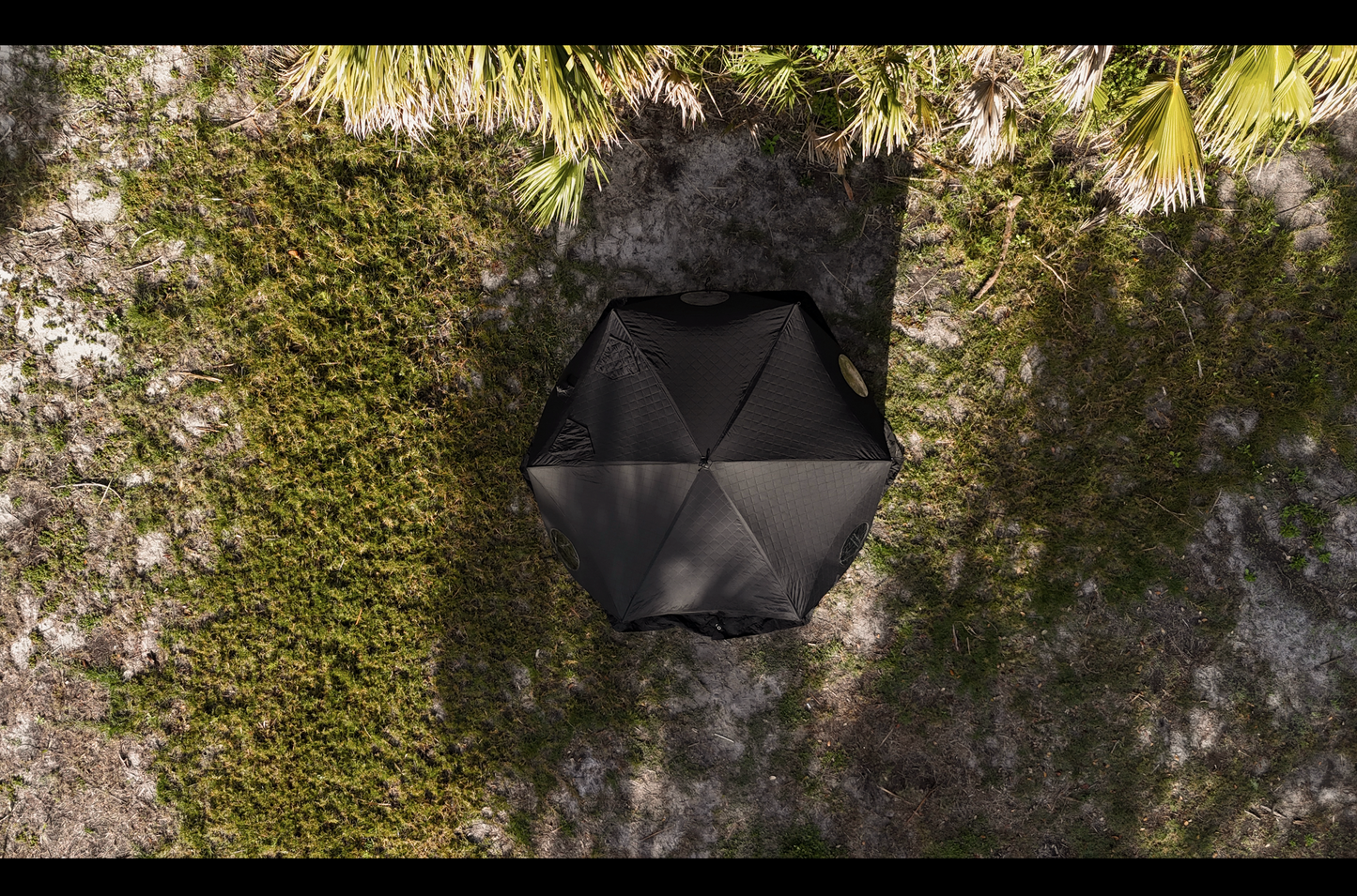 Overhead view of Dome Sauna Tent (8-person; tent only) set up in nature, highlighting its spacious design and portability for outdoor activities.