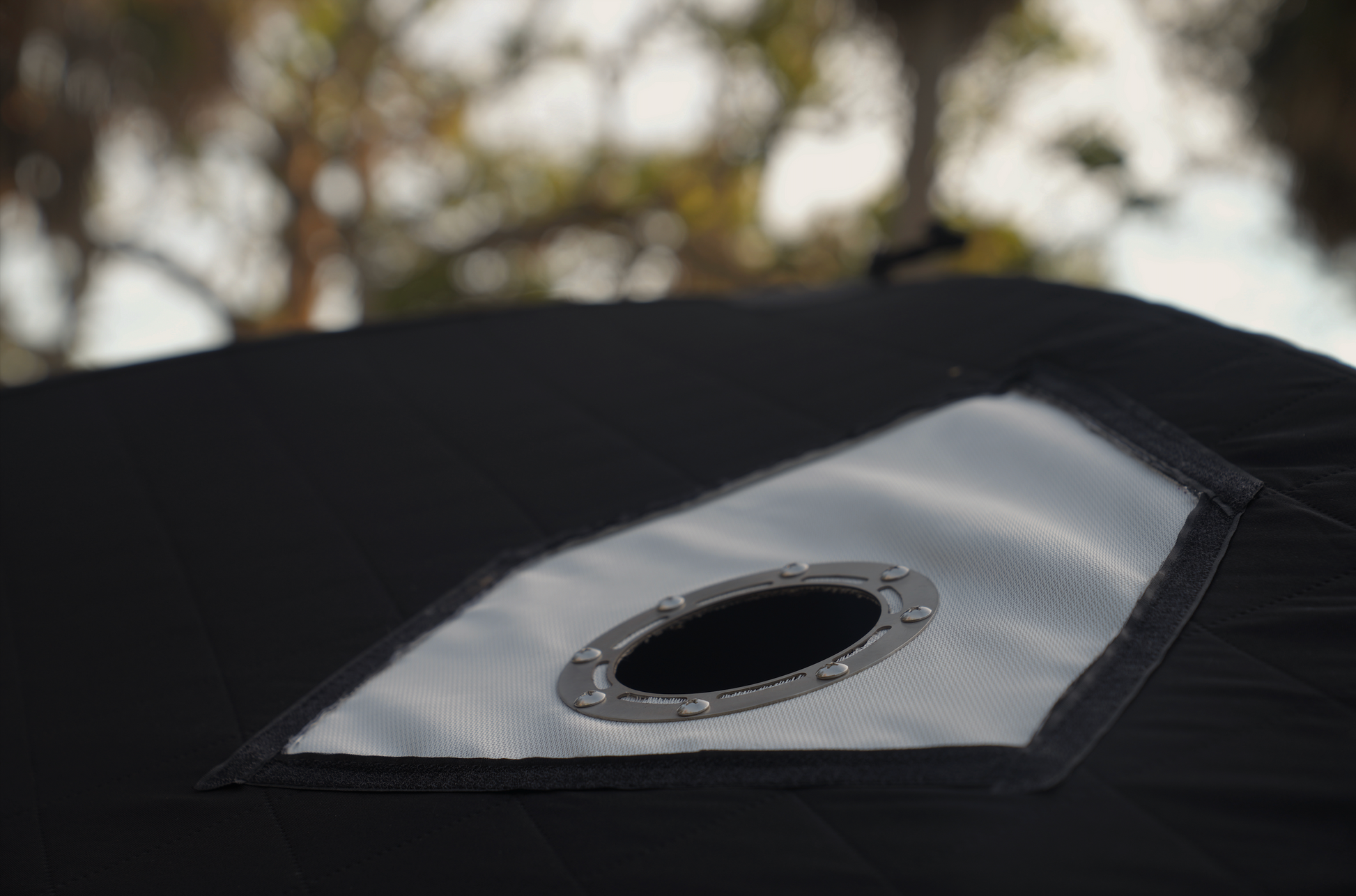 Close-up of Nova 6 Sauna Tent material showing grommet detail for ventilation