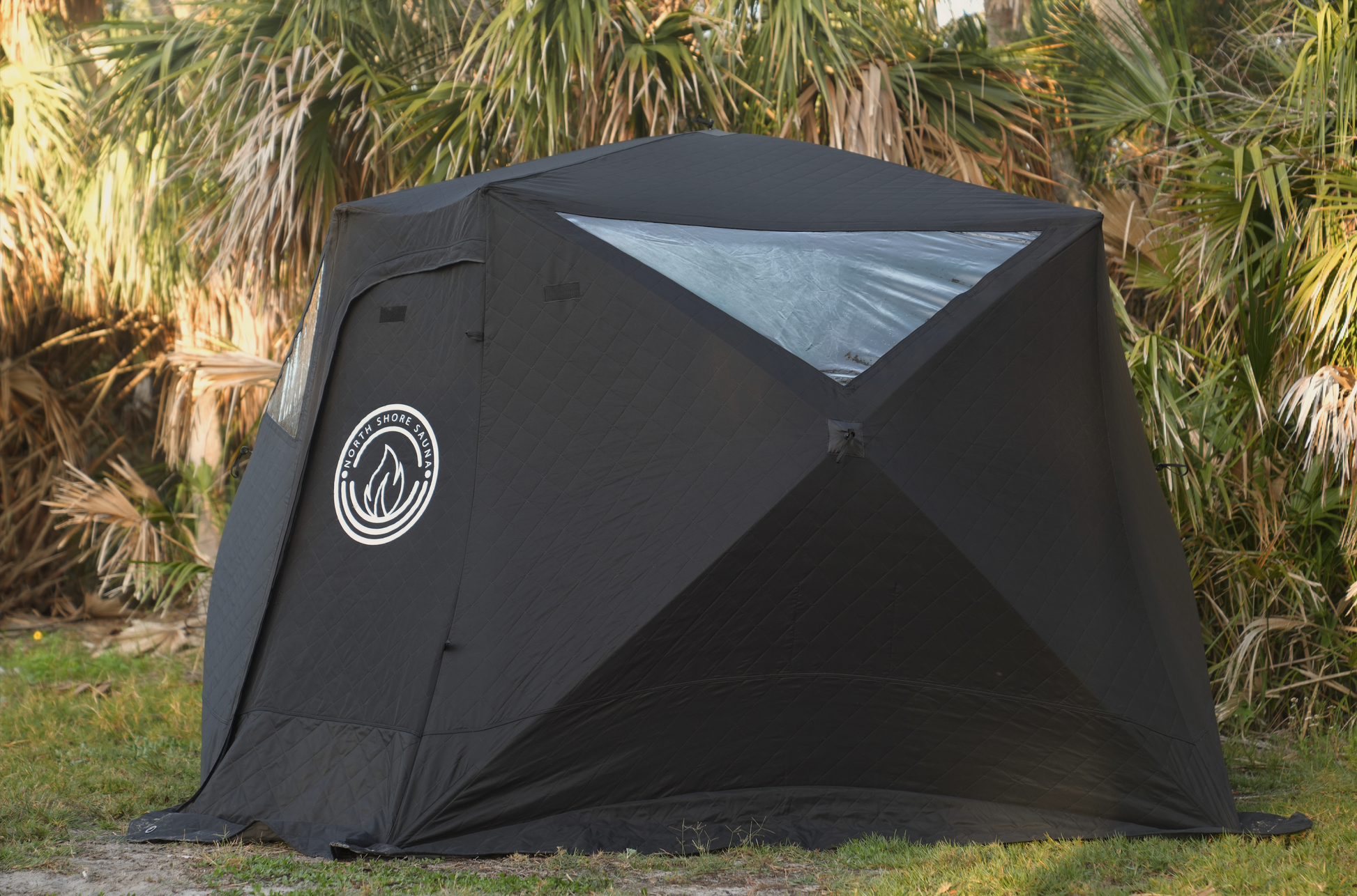 Nova 6 Sauna Tent (6-person; tent only) set up outdoors with rain cover and logo visible