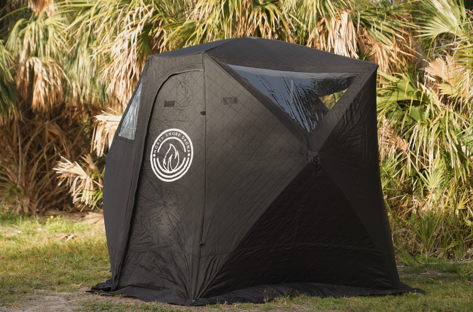 Nova 4 Sauna Tent (4-person; tent only) set up outdoors among trees, showcasing its durable, spacious design with heat-resistant walls.