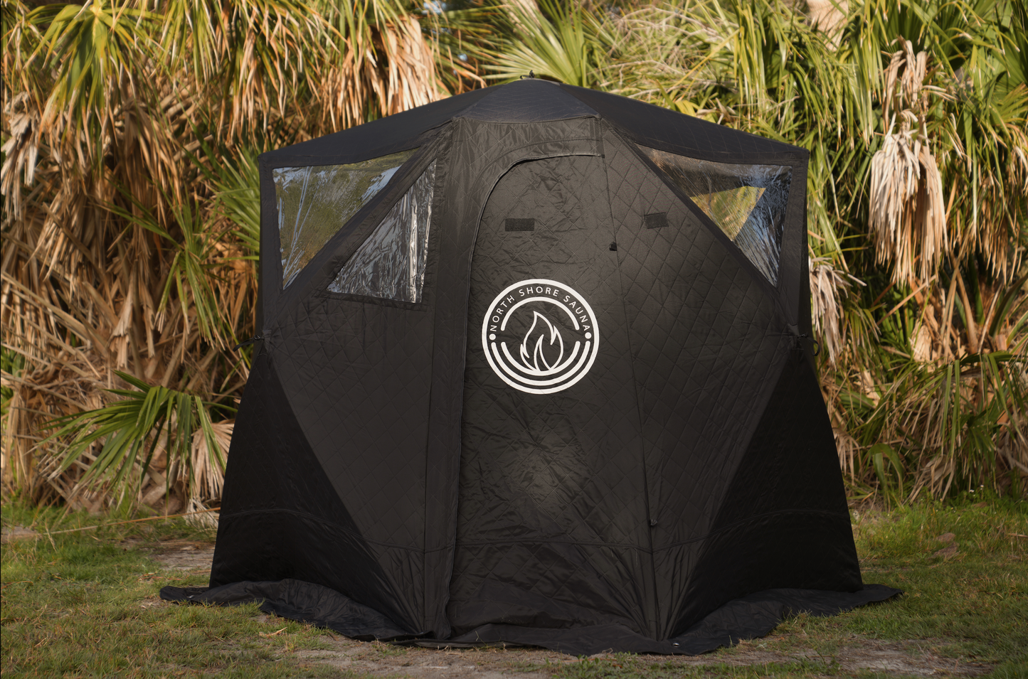 Nova 4 Sauna Tent (4-person; tent only) set up outdoors with rain cover and logo visible.