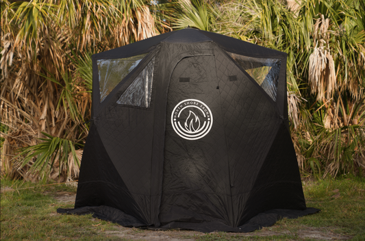 Nova 4 Sauna Tent (4-person; tent only) set up outdoors with rain cover and logo visible.