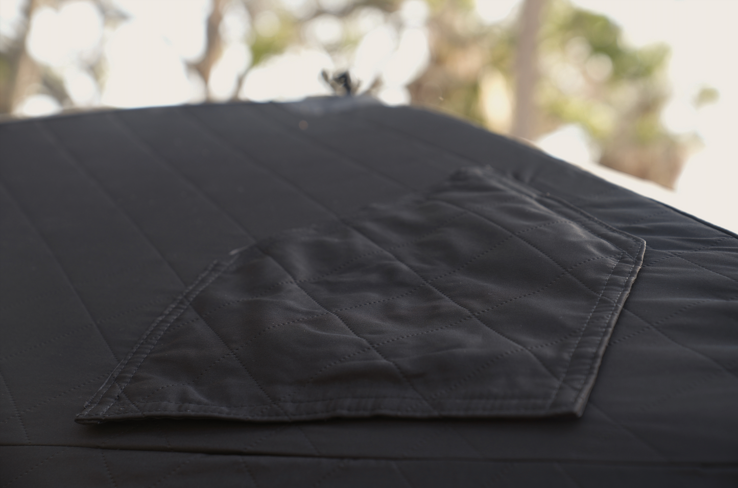Close-up of heat-resistant fabric on Nova 4 Sauna Tent (4-person; tent only) showcasing its durable design.