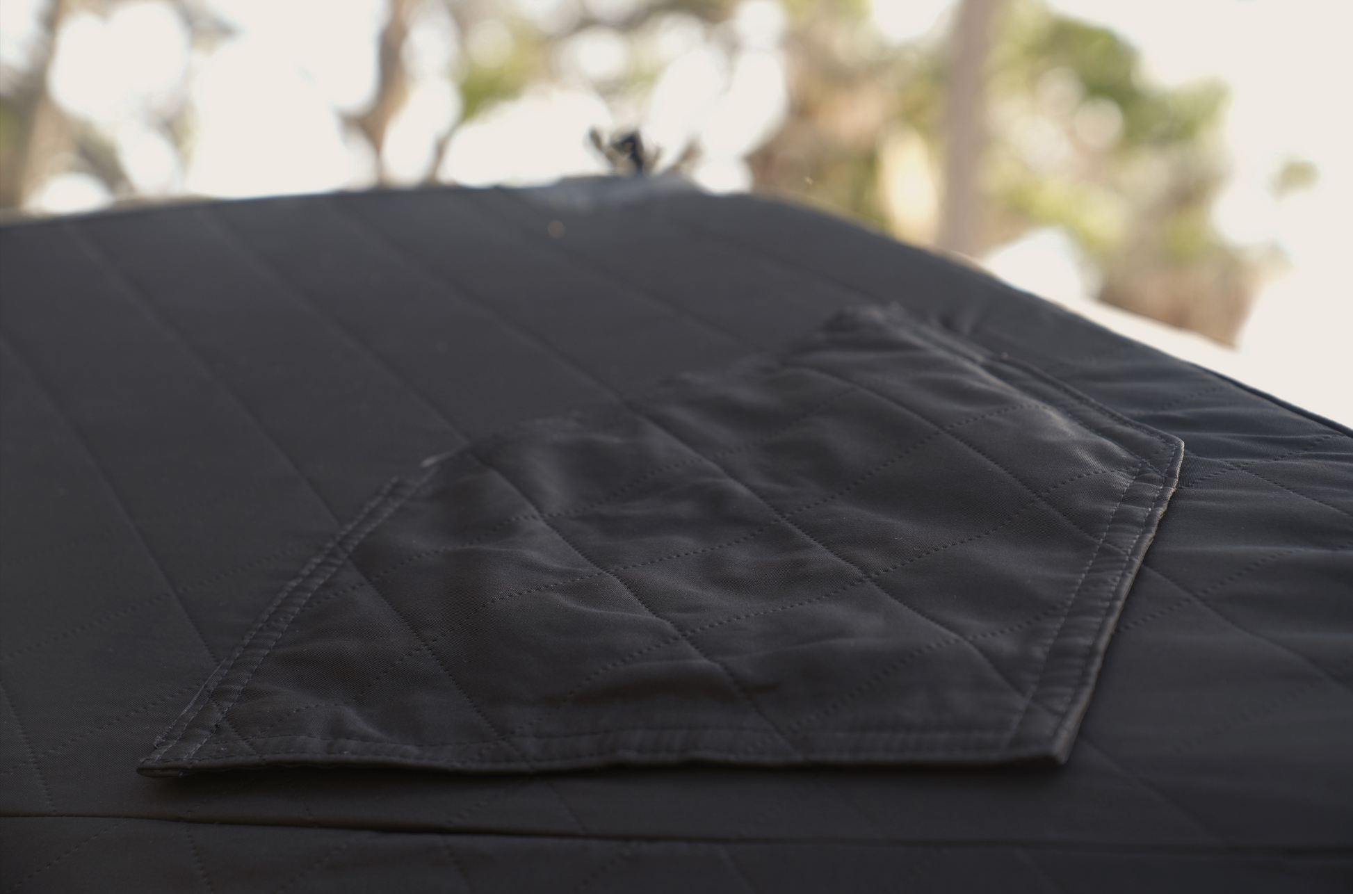 Close-up of heat-resistant fabric on Nova 4 Sauna Tent (4-person; tent only) showcasing its durable design.