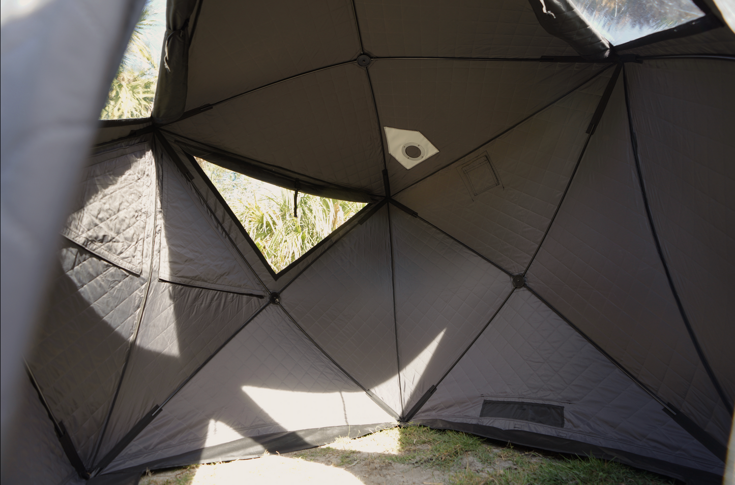 Interior view of Mini Cube Sauna Tent (2-person; tent only) showing geometric patterns and natural light.
