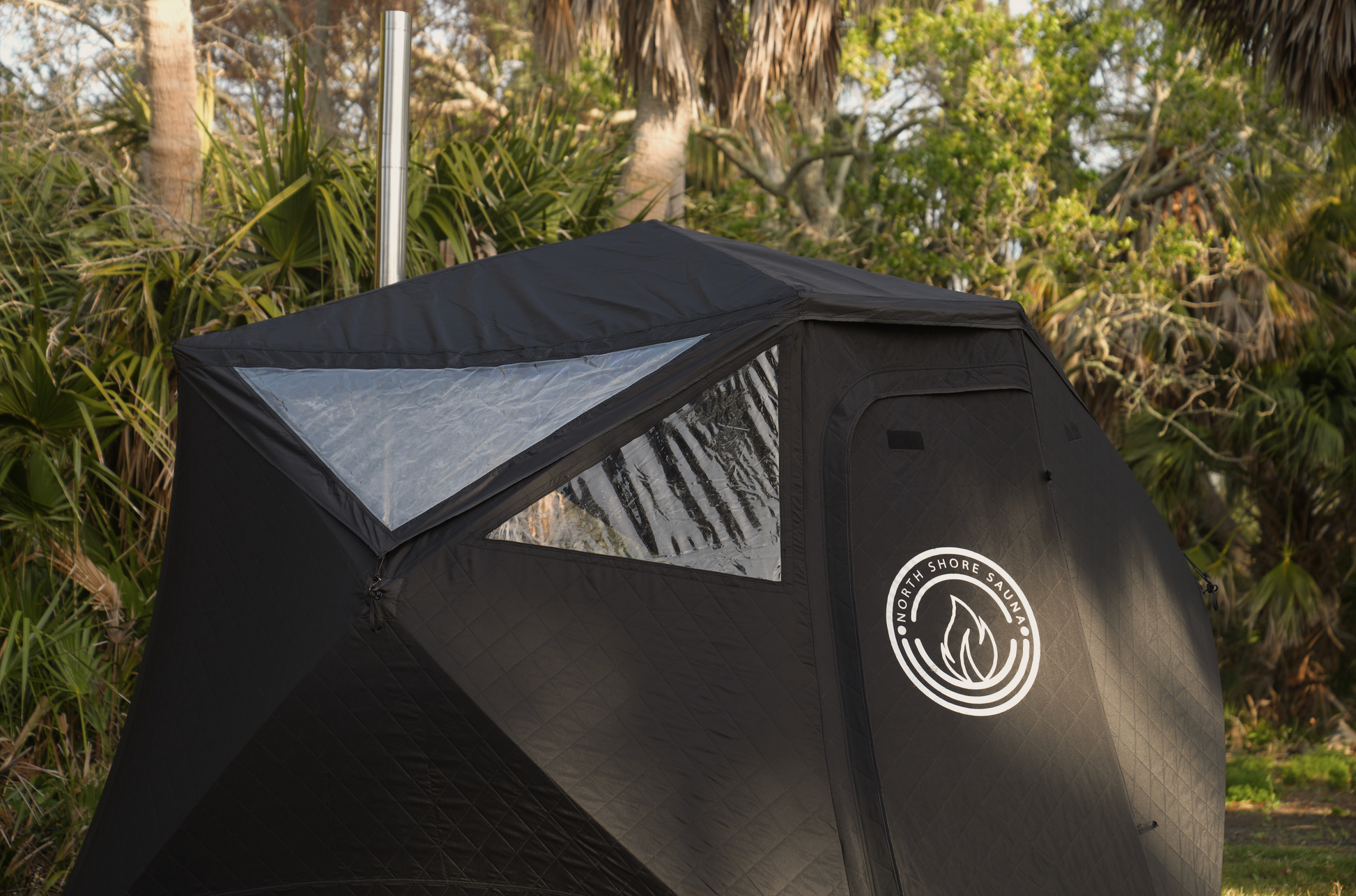 Nova 6 Sauna Tent Starter Package (6-person) set up outdoors with wood-fired stove, perfect for backyard relaxation and wellness.