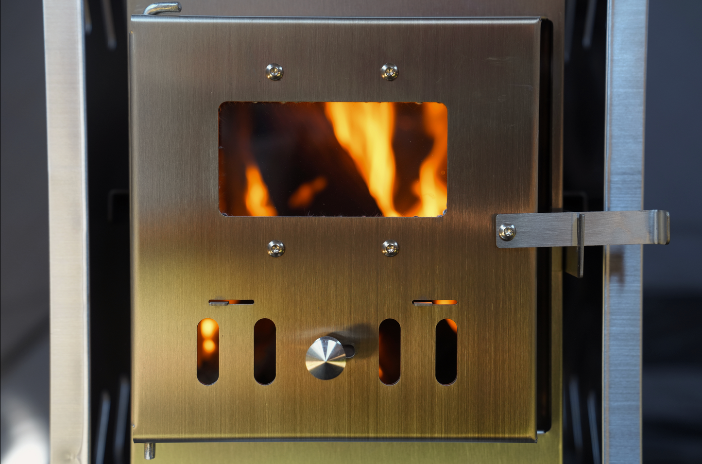 Wood-fired stove included in Dome Sauna Tent Starter Package (8-person) for enhanced sauna experience.