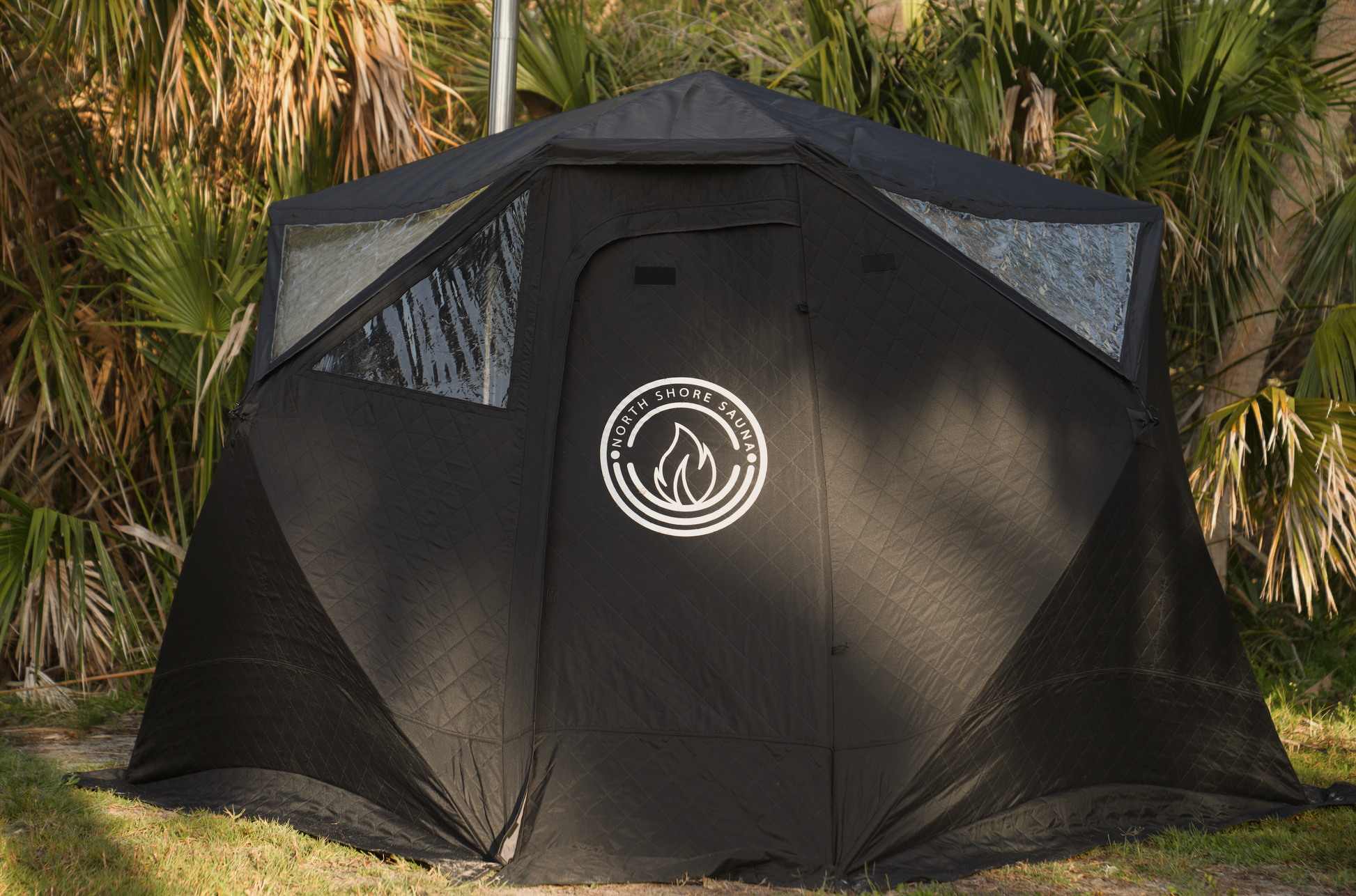 Nova 6 Sauna Tent Premium Package (6-person) shown in an outdoor setting, highlighting its durable and portable design.