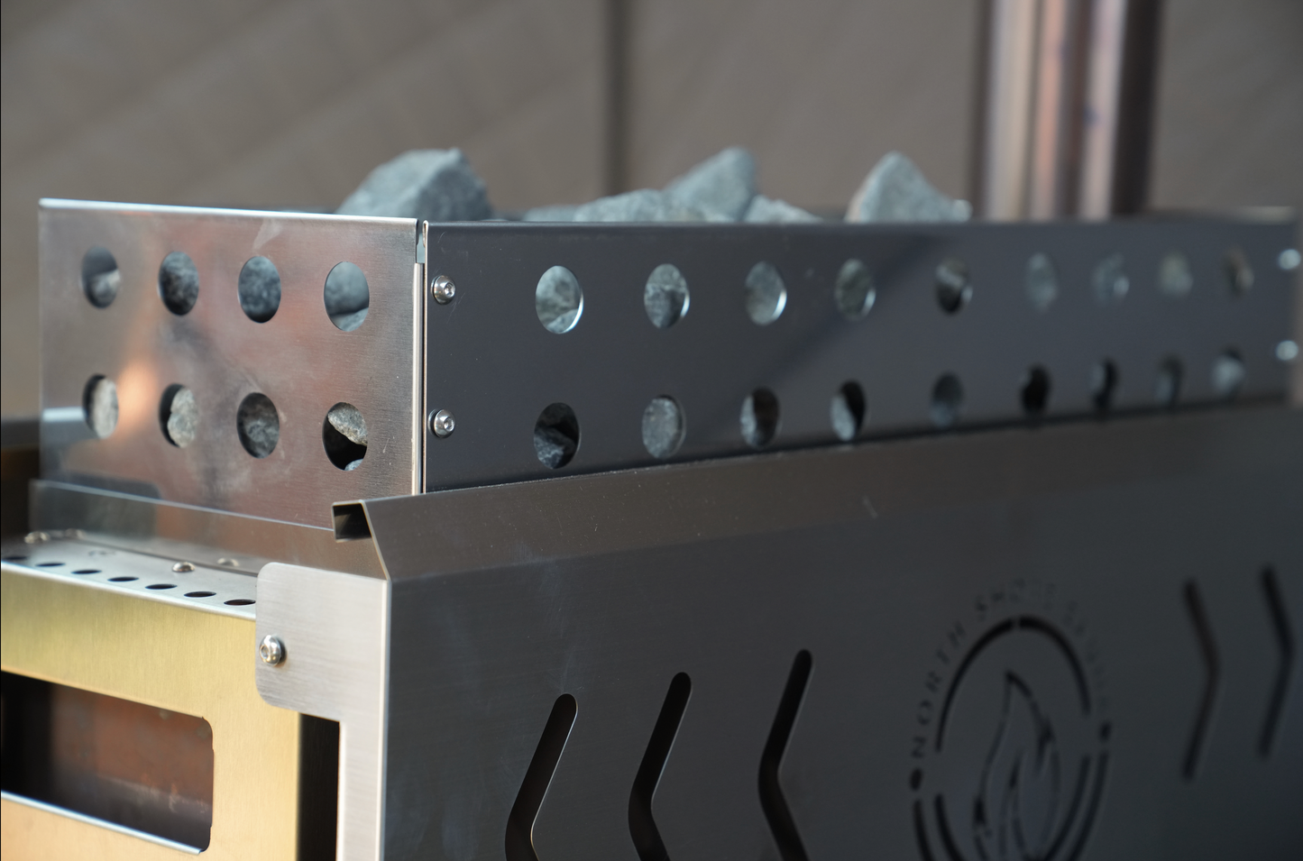 Close-up of heating rocks in the Dome Sauna Tent Elite Experience Package (8-person)