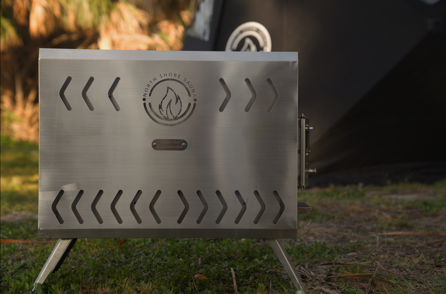 Sauna Tent Wood Stove | Portable | Brushed Stainless steel stove in outdoor setting