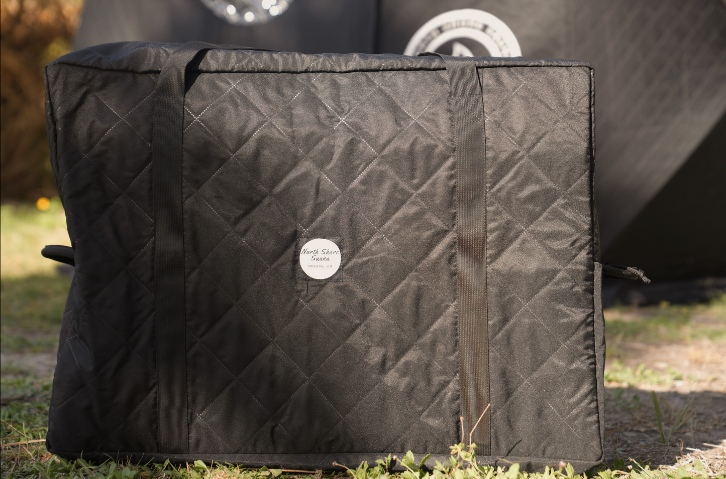 Insulated Stove Carrying Bag with handles for easy transport and cleanliness, preventing ash and dirt mess during vehicle transport.