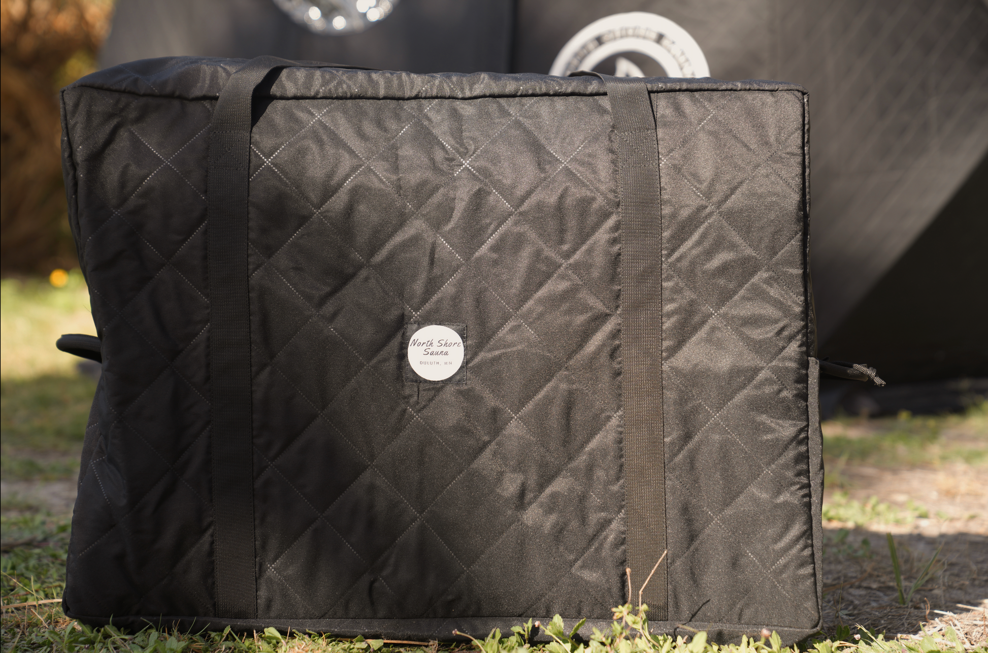 Insulated Stove Carrying Bag with handles for easy transport and cleanliness, preventing ash and dirt mess during vehicle transport.