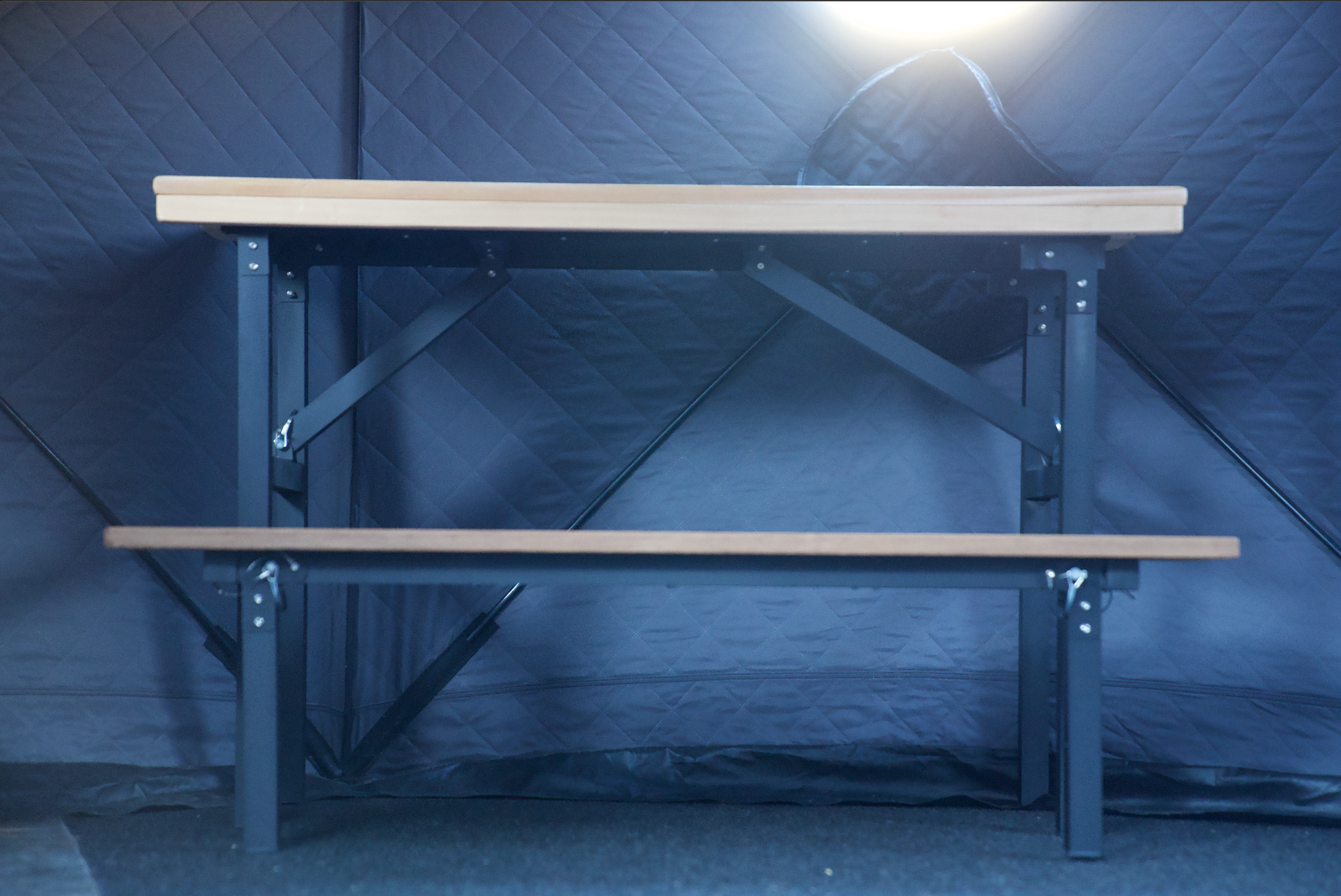Portable Sauna Bench inside a sauna, showing durable materials and lightweight design for easy transport and enhanced sauna experience.