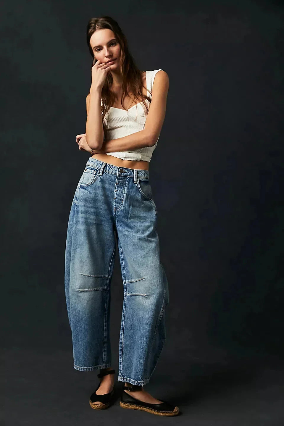 Model wearing Women’s Elastic Waist High Waisted Jeans with a modern Korean-inspired style, cropped cut, and loose fit.
