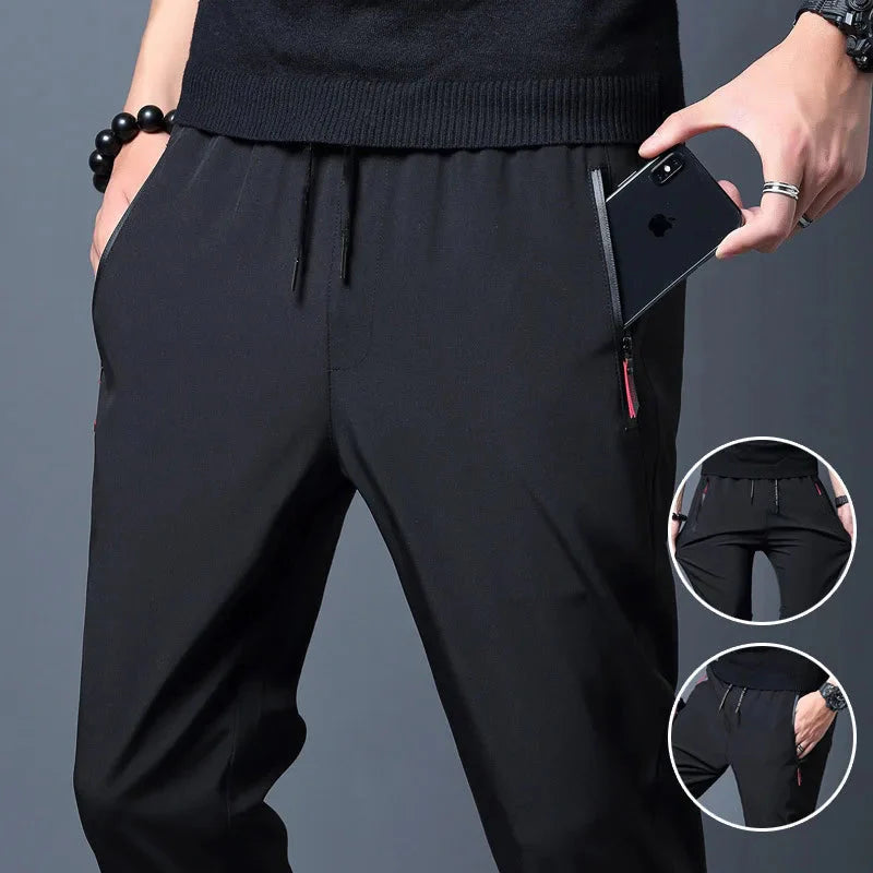 Slim Fit Stretch Jogger Pants with Elastic Waist in black, featuring comfortable stretch fabric and practical pockets for daily wear.