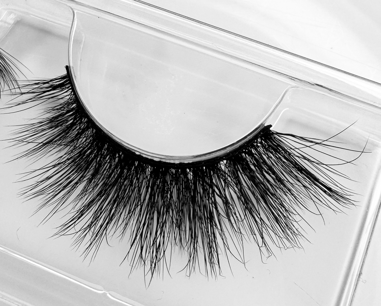 Shadow faux mink eyelashes with cat eye effect, ultra-dramatic and fluffy, vegan cruelty-free, includes free eyelash brush, easy to apply.