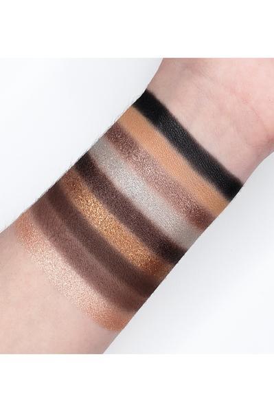 Smoke it Out - GES12 eyeshadow palette swatch displaying matte, foiled, and shimmer shades on an arm for rich pigmentation and blending.