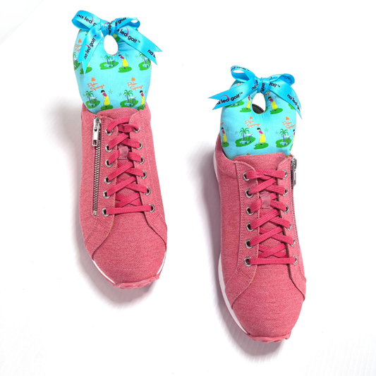 Golf Shoe Stuffers in pink sneakers with blue patterned protectors and bright ribbons, ideal for preserving shoe shape and style.
