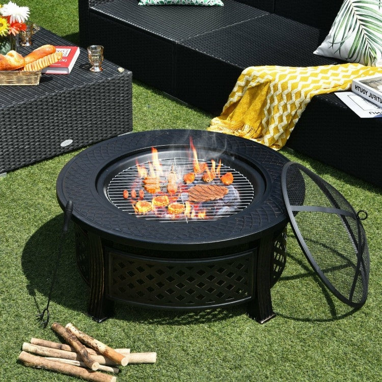 Rustic Steel Outdoor Fire Pit with BBQ Grill with Poker and Mesh Cover set up on a patio with burning fire and cooking food.