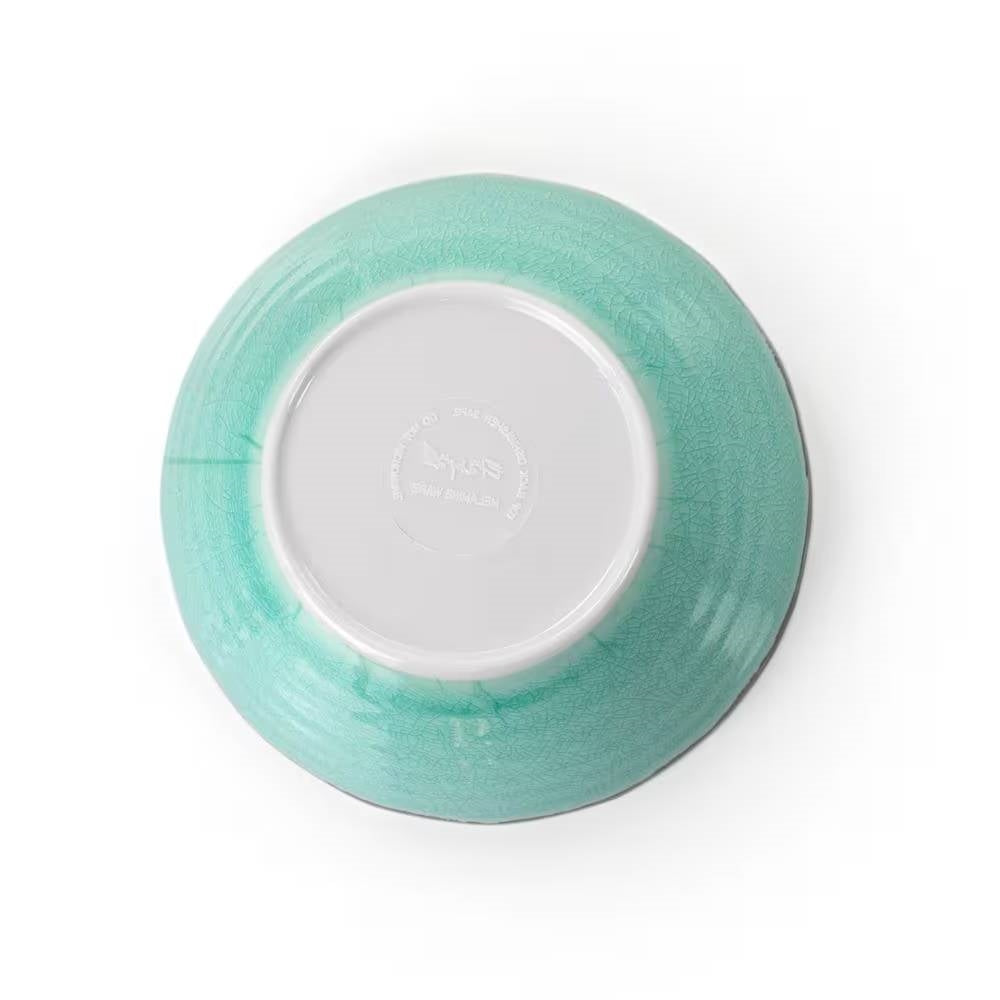 Bottom view of a bowl from the 12-Piece Melamine Plates Bowls Dinnerware Set in Turquoise Blue - Service for 4, showing the crackle pattern.