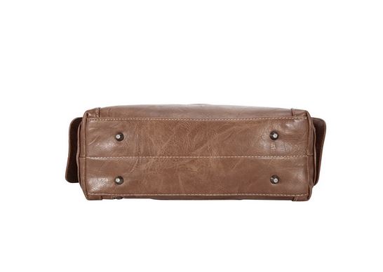 Bottom view of Western Elegance Tooled Leather Purse showcasing quality leather and sturdy base with metal feet.