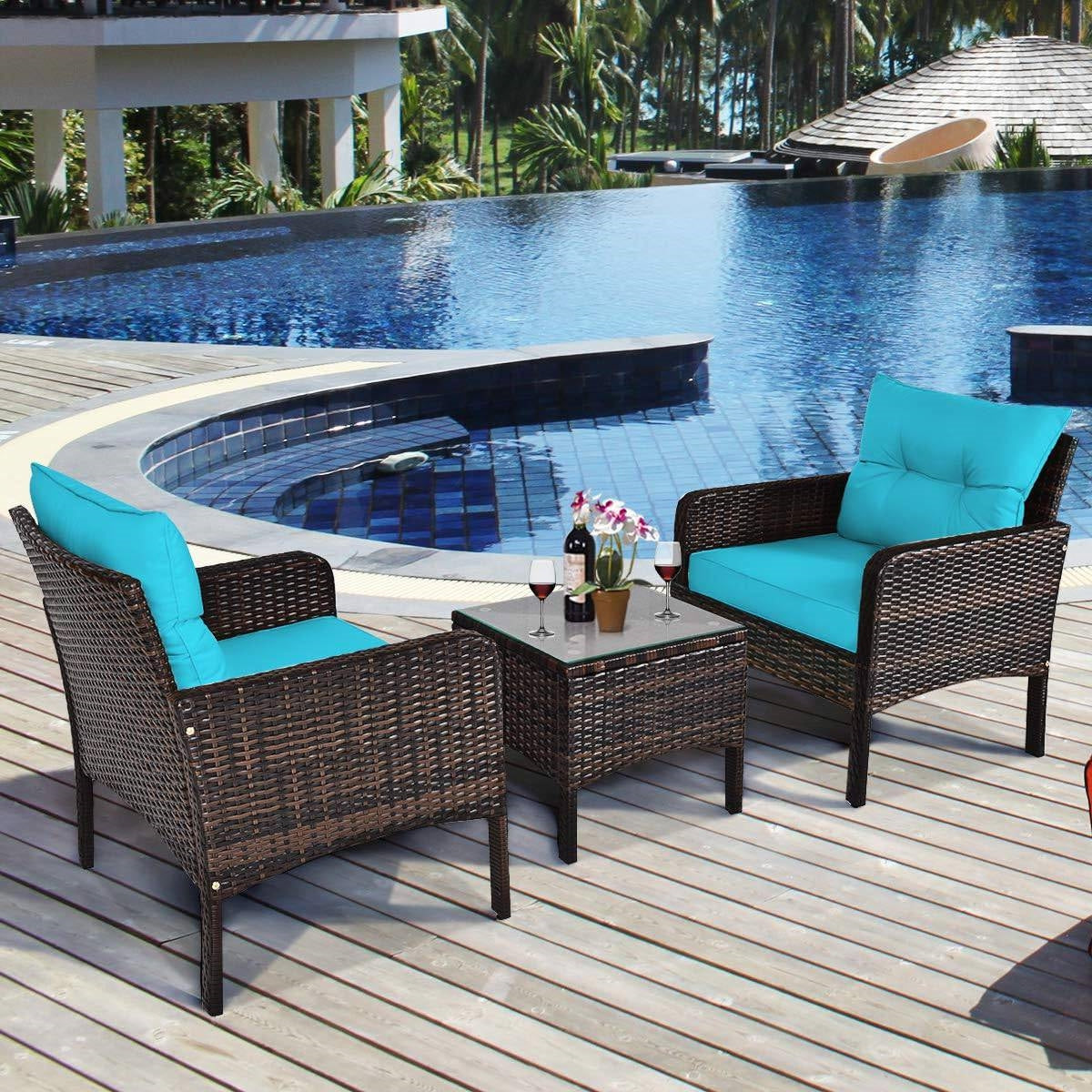 3-Piece Brown PE Rattan Outdoor Patio Furniture Dining Set w/ Turquoise Cushions by the pool