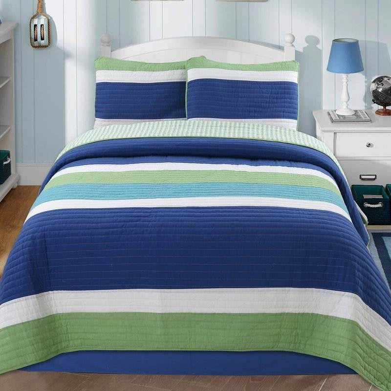 Twin Size Navy Blue/Green/Teal/White Stripe 100-Percent Cotton Quilt Set on bed in bright bedroom.