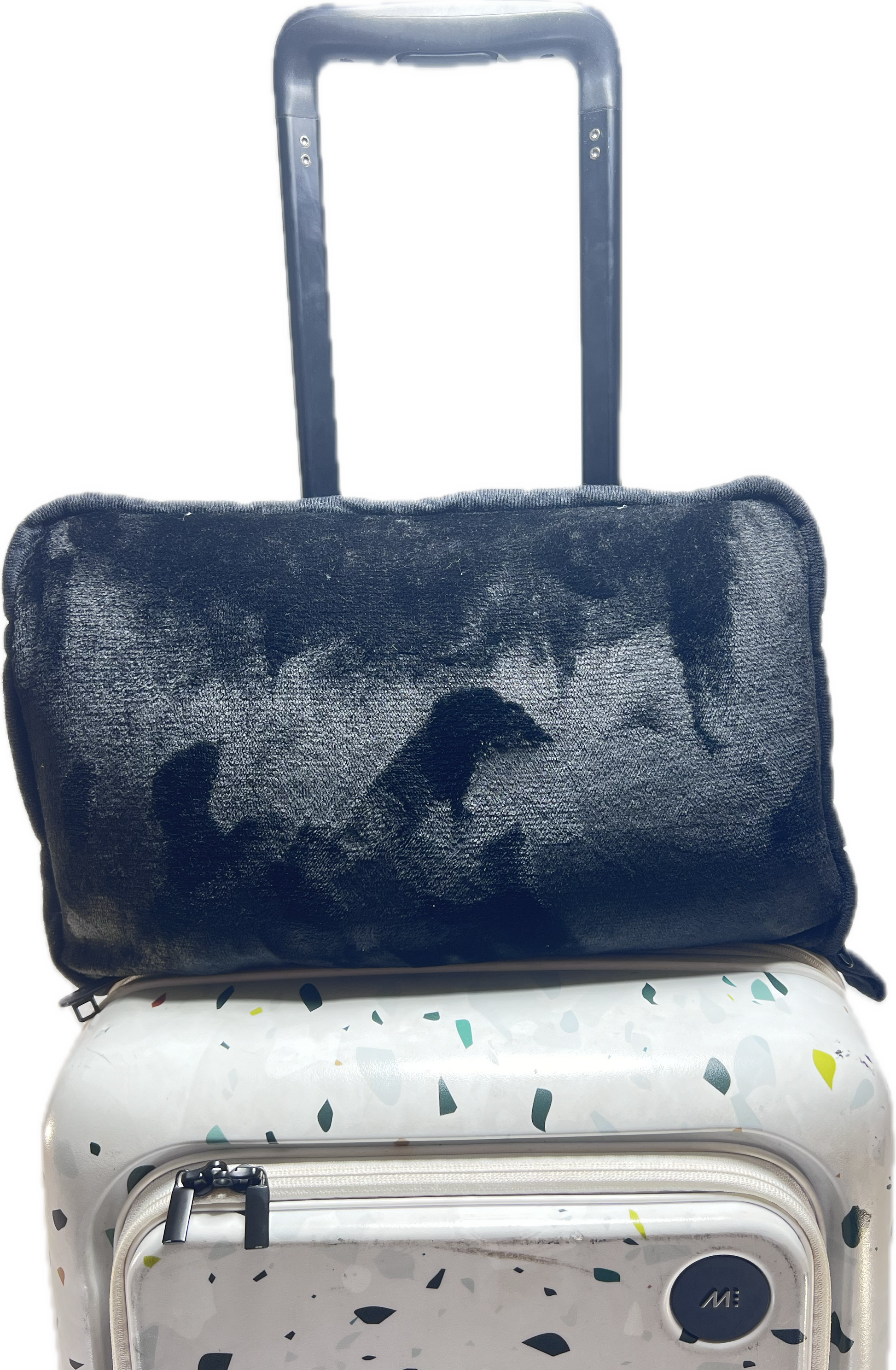Golf / Travel Blanket in carry case on luggage, showcasing stylish flannel design with trolley sleeve for easy travel.