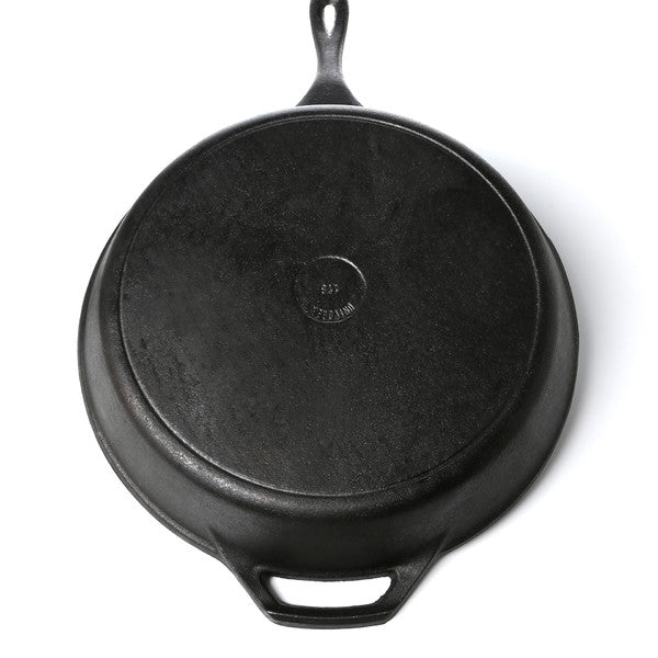 Bottom view of Pre-Seasoned Cast Iron 14-inch Round Skillet with handle, perfect for easy cooking and quick clean-up, includes free shipping.