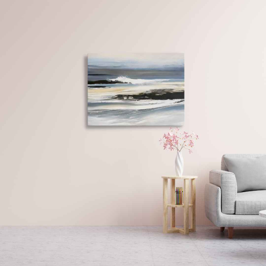 Ocean Waves Crashing on Rocks canvas print in living room with vase and side table