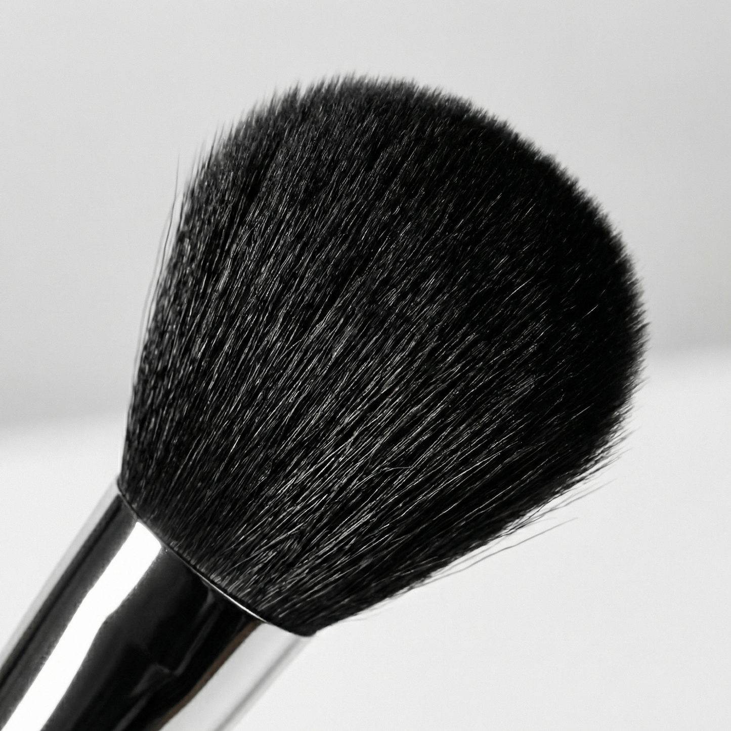 Velvet Brush for seamless powder application and airbrushed finish.