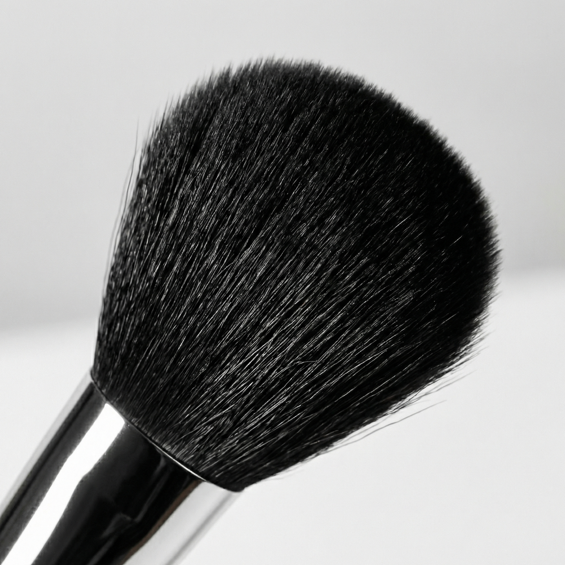 Velvet Brush for seamless powder application and airbrushed finish.