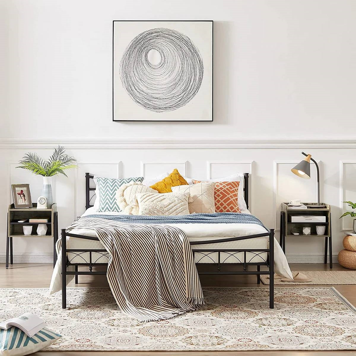 Bedroom with Set of 2 Modern Industrial Grey Wood Black Metal Side Table Nightstand End Table beside a black metal bed.