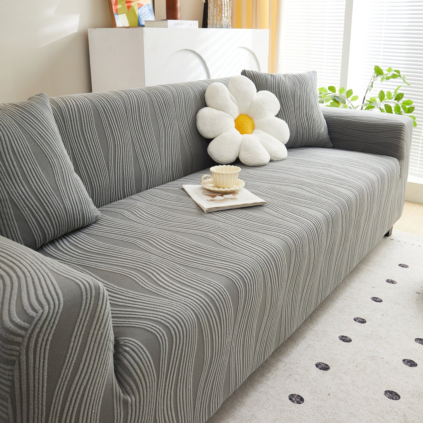 Modern living room with Textured Wave Stretch Sofa Couch Cover, Soft Washable Spandex Furniture Slipcovers, and decorative pillow.