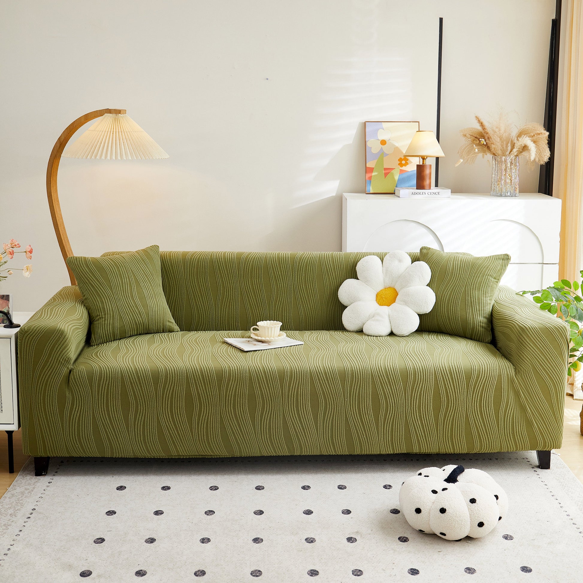 Textured Wave Stretch Sofa Couch Cover on green sofa, Soft Washable Spandex Furniture Slipcovers in stylish living room.
