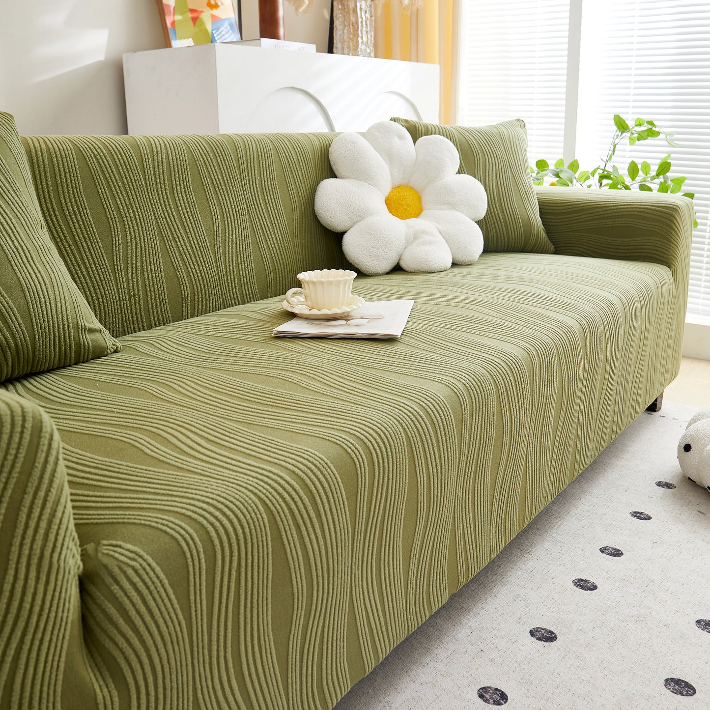 Living room with Textured Wave Stretch Sofa Couch Cover in green, showcasing soft washable spandex furniture slipcovers.