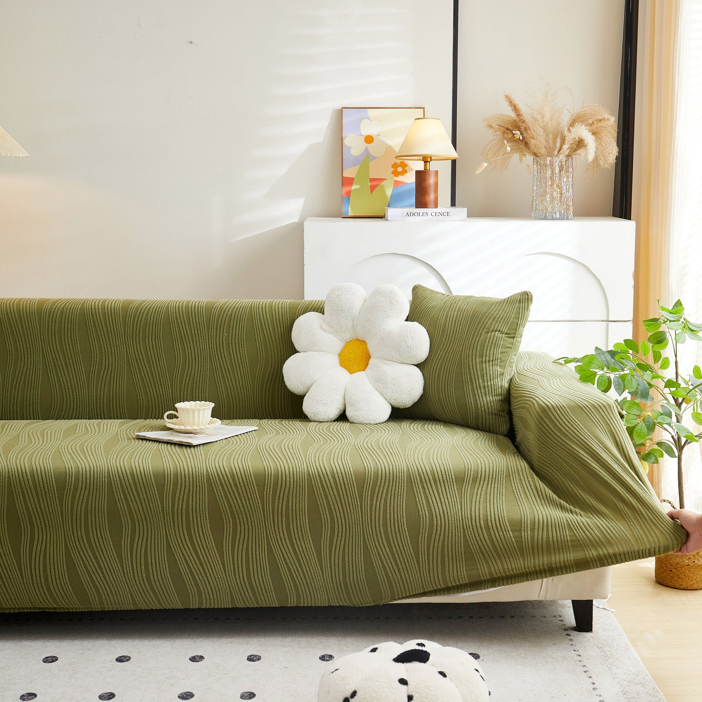 Textured Wave Stretch Sofa Couch Cover, Soft Washable Spandex Furniture Slipcovers on a stylish green couch in a living room.