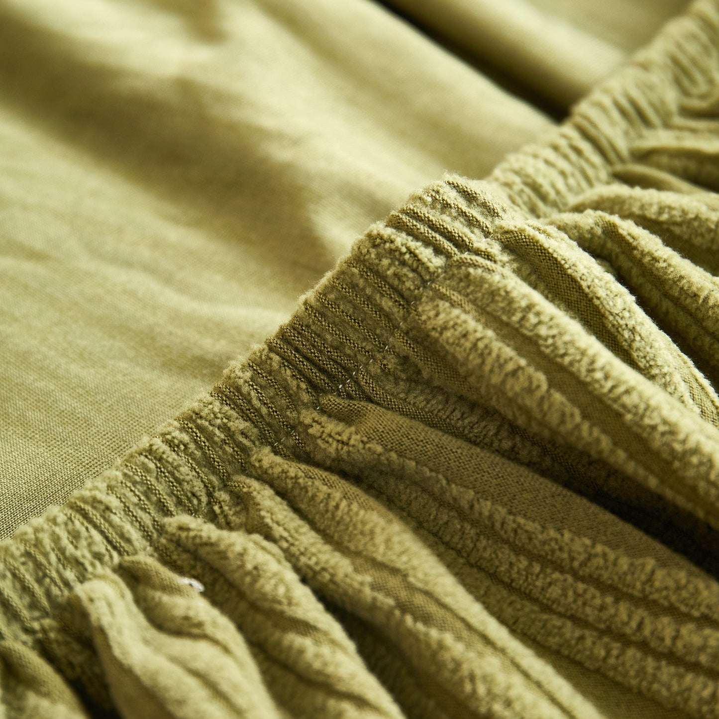 Textured Wave Stretch Sofa Couch Cover, Soft Washable Spandex Furniture Slipcovers in elegant wave pattern, close-up view