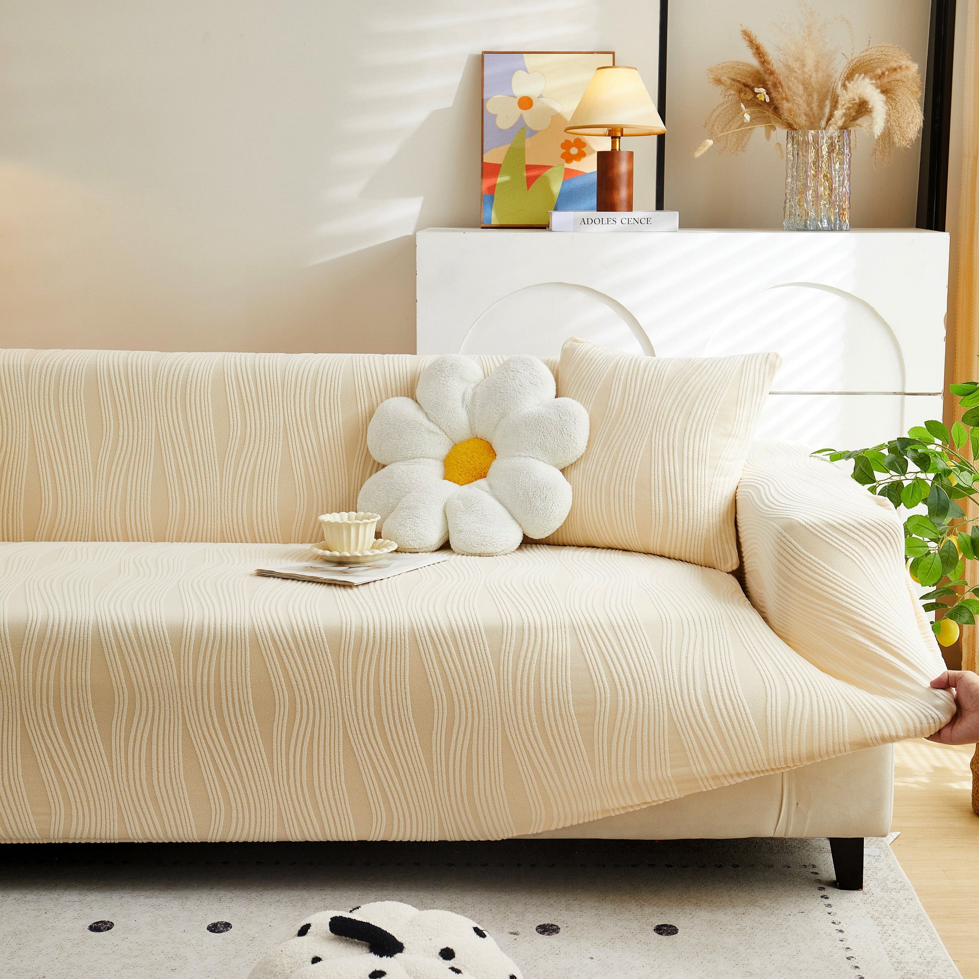 Living room featuring a sofa with Textured Wave Stretch Sofa Couch Cover, Soft Washable Spandex Furniture Slipcovers in a modern wave pattern.