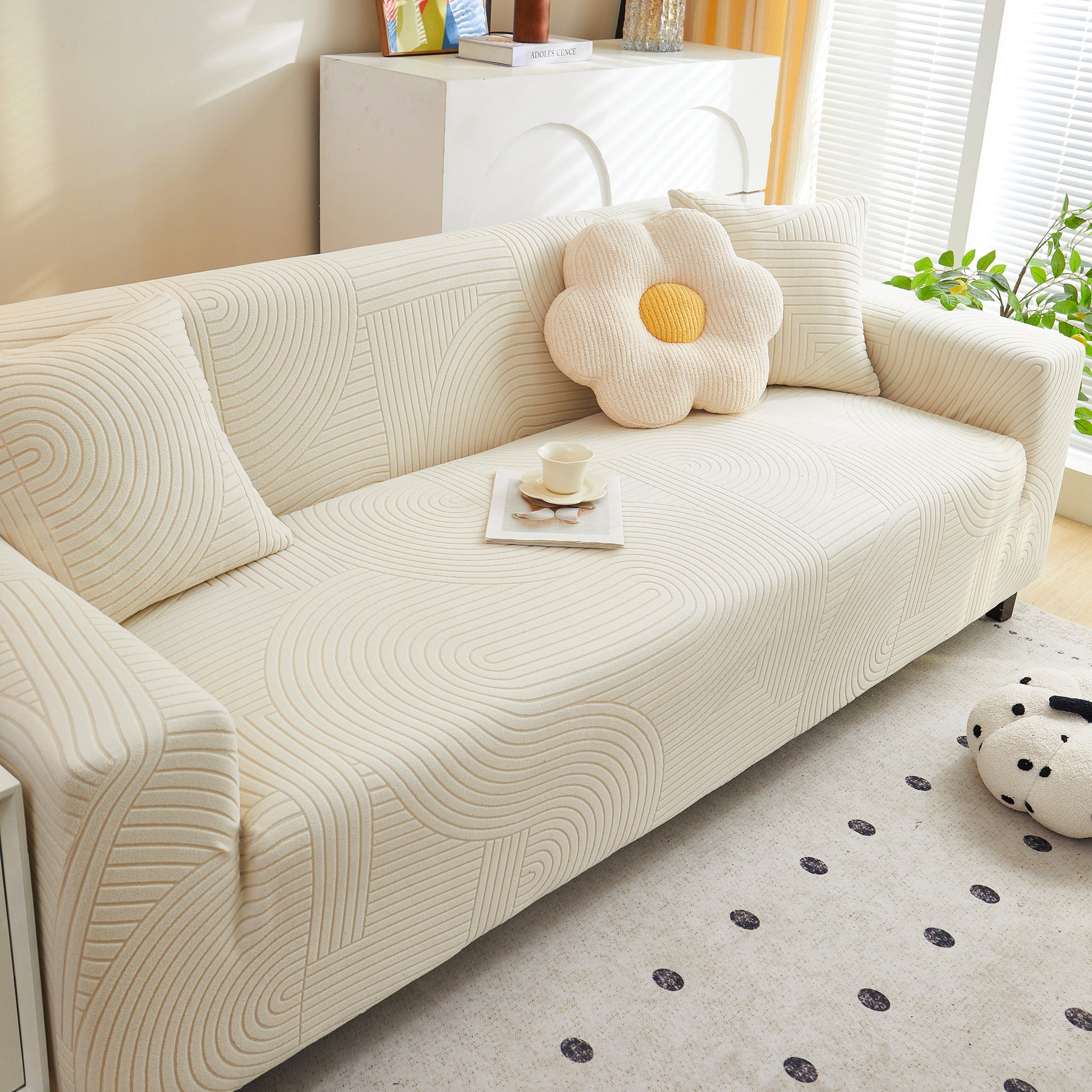Fleece Stretch Sofa Slipcover Washable Soft Spandex Couch Cover Furniture Protector in geometric pattern on living room sofa.