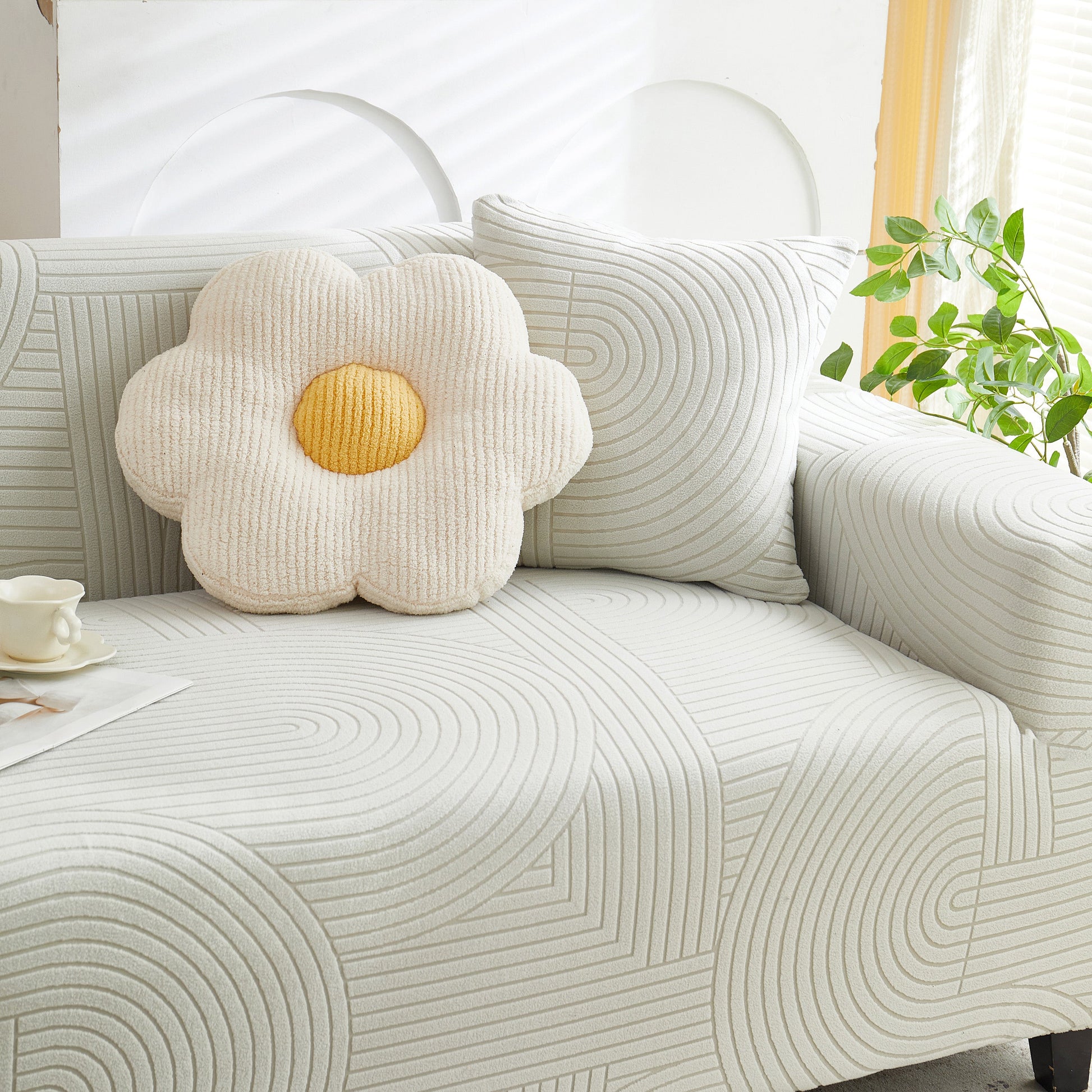 Living room with sofa covered in Fleece Stretch Sofa Slipcover Washable Soft Spandex Couch Cover Furniture Protector, featuring a wave pattern.