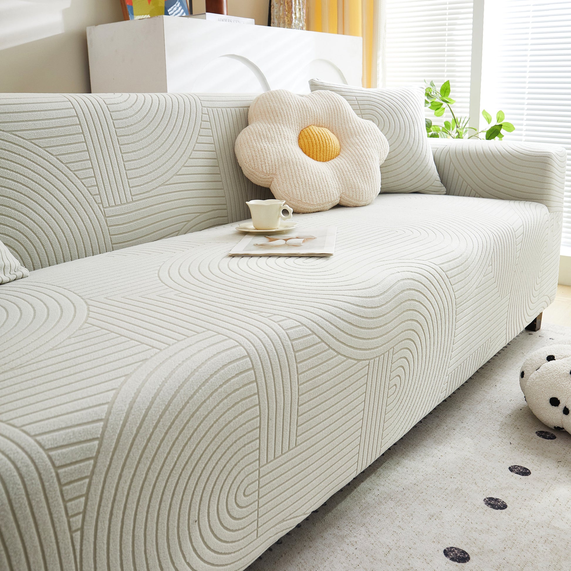Living room with geometric patterned sofa featuring Fleece Stretch Sofa Slipcover Washable Soft Spandex Couch Cover Furniture Protector