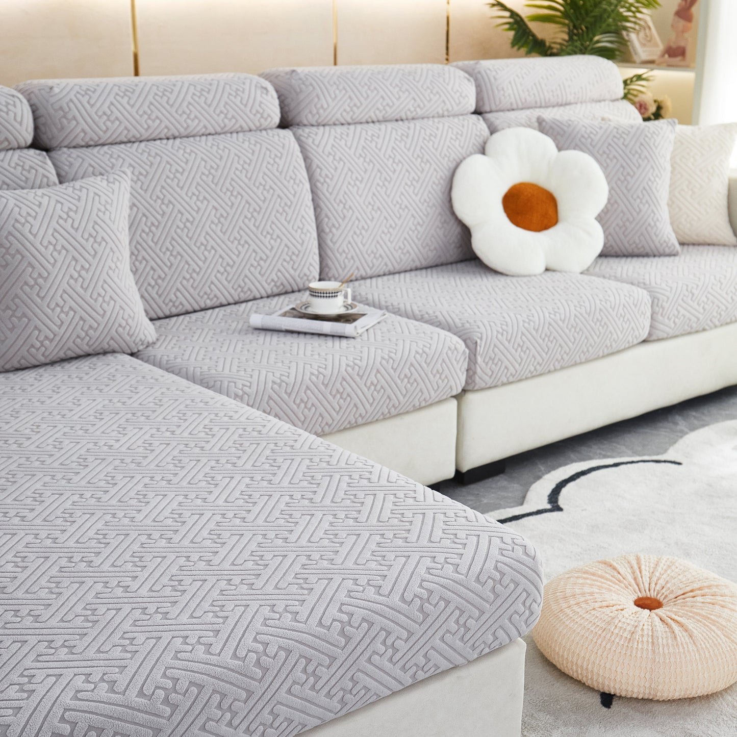 Polar Fleece Couch Cushion Covers on modern sofa with geometric pattern, elastic furniture protector for pets, kid, offering style and comfort.